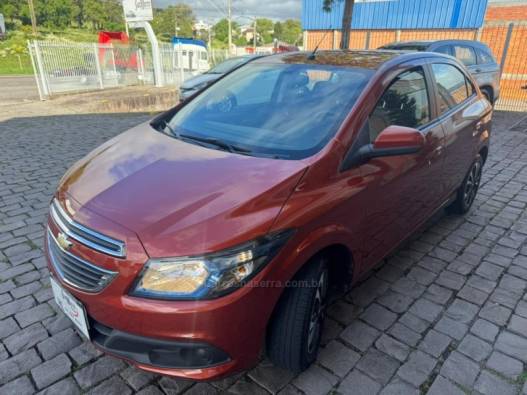 CHEVROLET - ONIX - 2013/2013 - Laranja - R$ 45.000,00