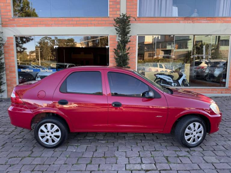 CHEVROLET - PRISMA - 2009/2010 - Vermelha - R$ 26.000,00
