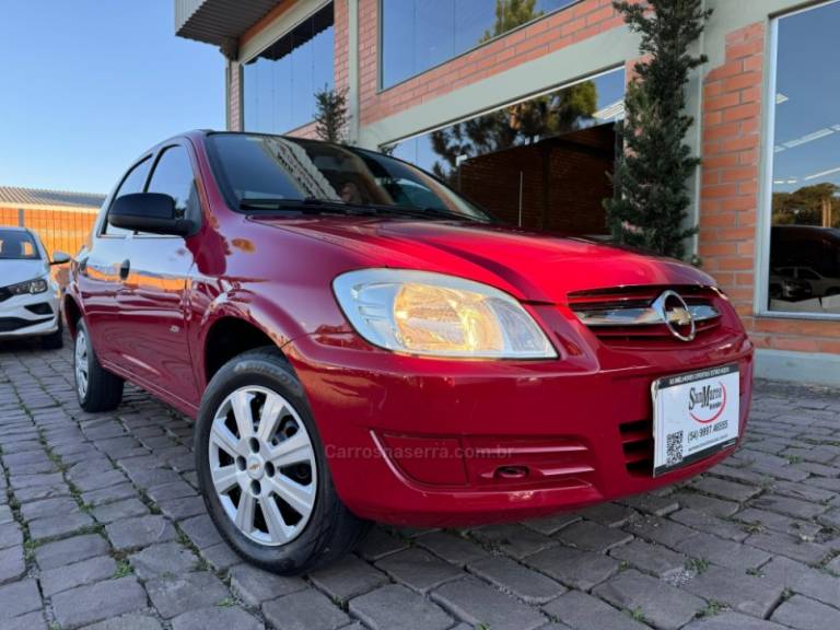 CHEVROLET - PRISMA - 2009/2010 - Vermelha - R$ 26.000,00