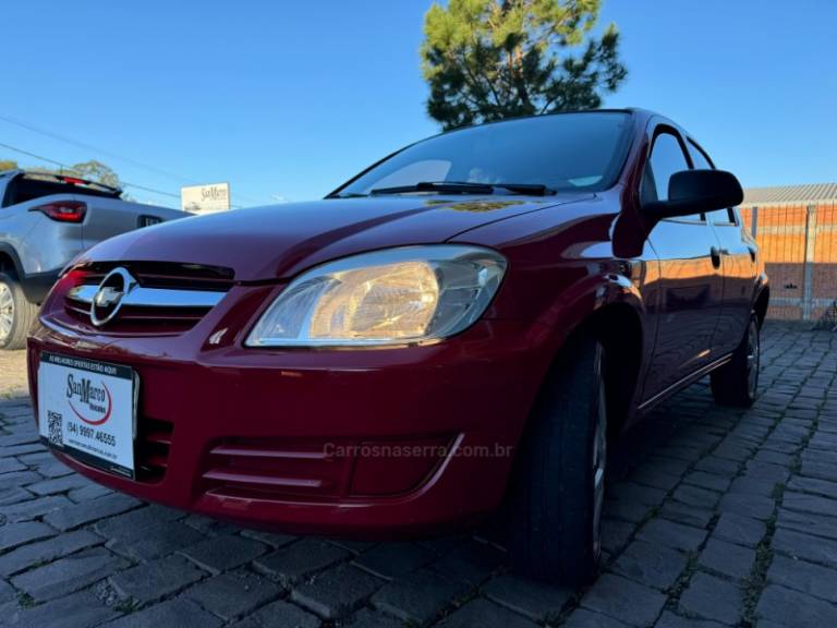 CHEVROLET - PRISMA - 2009/2010 - Vermelha - R$ 26.000,00