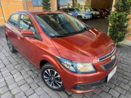 CHEVROLET - ONIX - 2013/2013 - Laranja - R$ 45.000,00