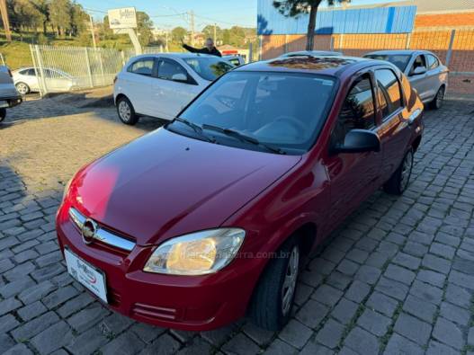 CHEVROLET - PRISMA - 2009/2010 - Vermelha - R$ 26.000,00