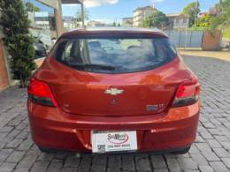 CHEVROLET - ONIX - 2013/2013 - Laranja - R$ 45.000,00