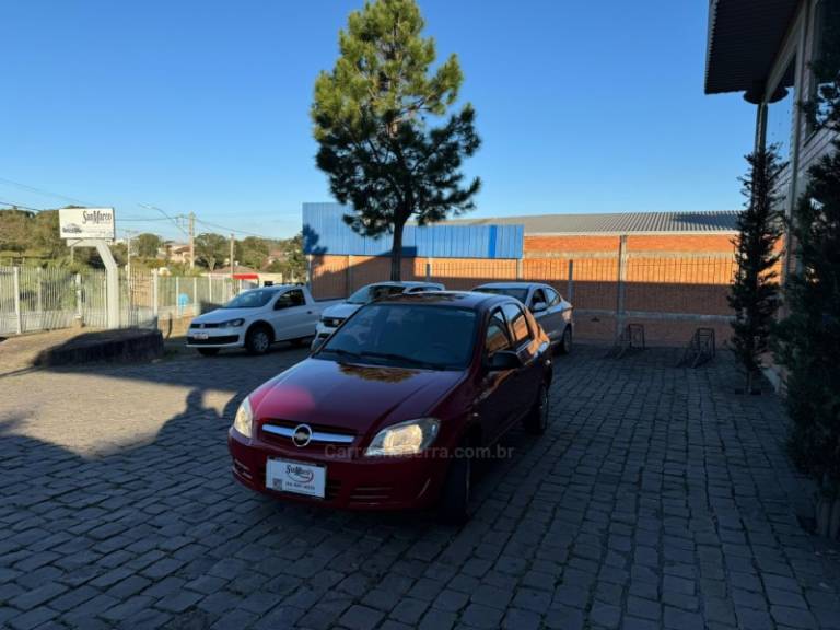 CHEVROLET - PRISMA - 2009/2010 - Vermelha - R$ 26.000,00