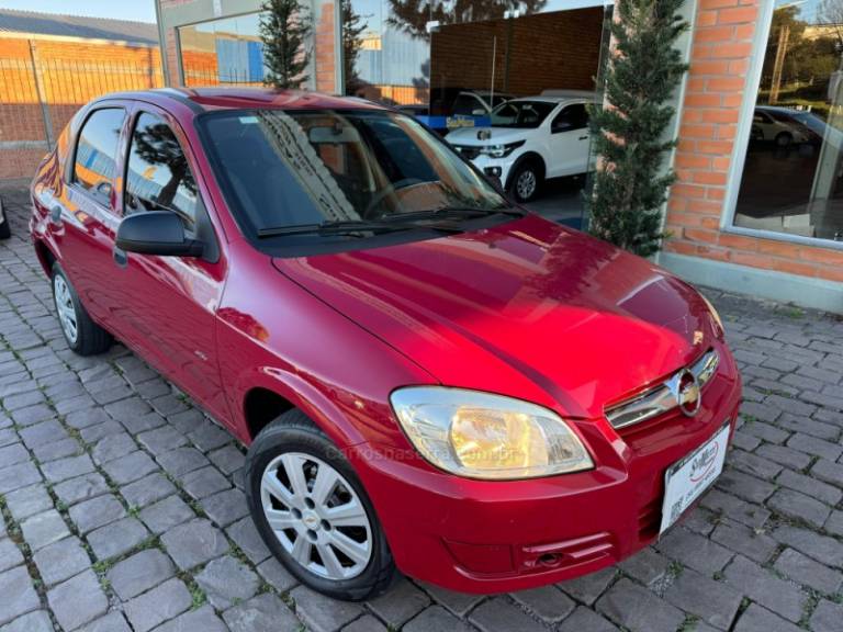 CHEVROLET - PRISMA - 2009/2010 - Vermelha - R$ 26.000,00